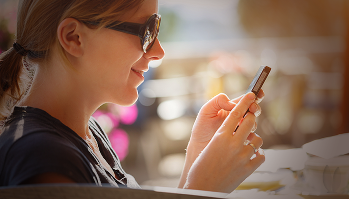 A parent filling out a mobile registration form.