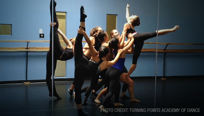 Turning Pointe Academy of Dance students practicing their final routine pose