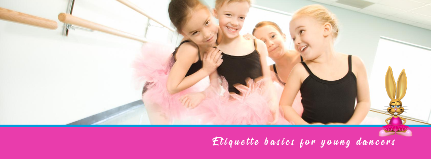 Etiquette basics for young dancers. 4 young female dancers smiling together in a studio.