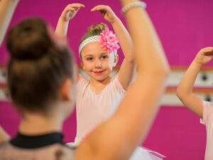A young dancer rehearses before a recital