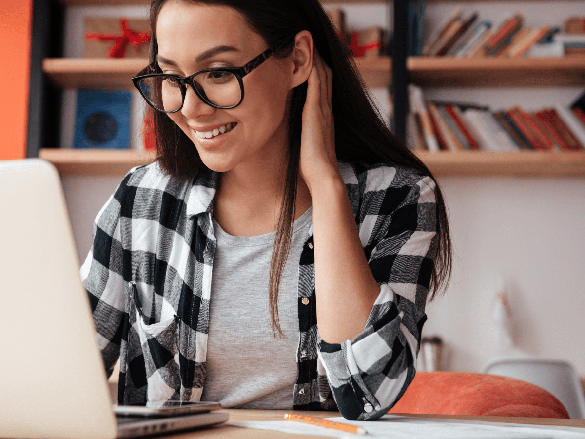 Woman looking at Jackrabbit's executive dashboard