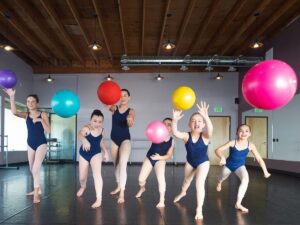 group-of-kids-playing-dodgeball-in-studio